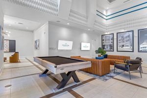 Apartments in Miramar A lobby with a pool table and billiard table. Miramar Park Apartments